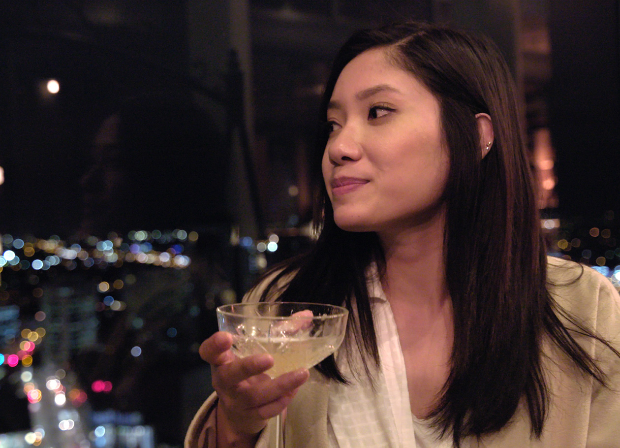 Woman Drinking cocktail | ANYDOKO Studios a Travel, Food and Lifestyle Content & Production Agency in Hong Kong, Sydney and Asia